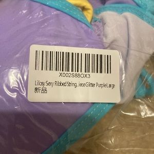 Purple and yellow bathing suit